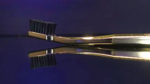 Tooth brush  on dark background isolated Foto stock