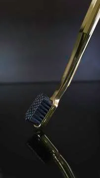 Tooth brush  on dark background isolated Stock Photos