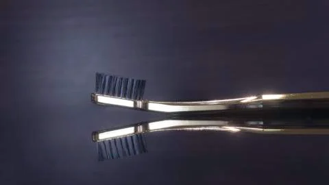 Tooth brush  on dark background isolated Foto stock
