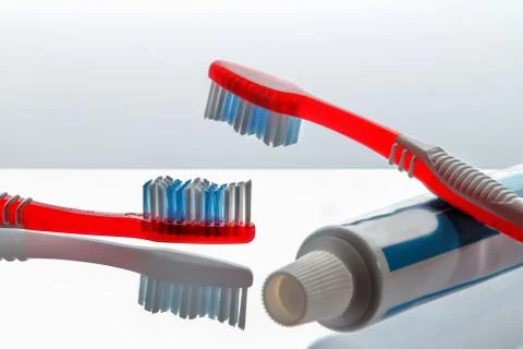 Tooth brush with paste isolated over white background 库存照片