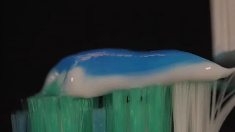 Tooth brush with tooth paste macro shot  Video stock 147426097