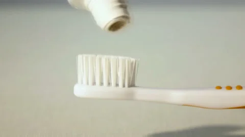 Tooth brush with tooth paste on white background Stock Footage 58732561