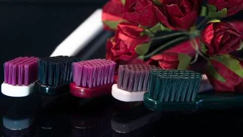 Tooth brushes close up isolated on the darck background. Foto stock