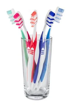 Tooth brushes glass Stock Photos