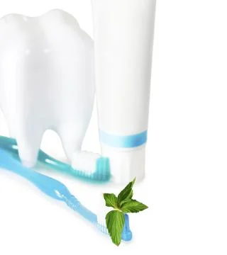 Tooth brushes with mint, tooth paste and dental floss isolated on white. Stock Photos
