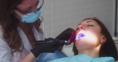 Tooth filling ultraviolet lamp Stock Footage