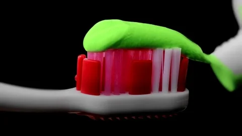 Tooth Paste and Brush Stock Footage 77697314