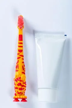 Tooth paste and toothbrush Stock Photos