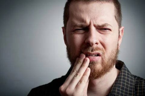 Toothache - man with teeth problems Stock Photos
