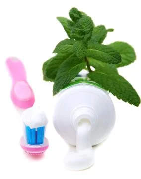 Toothbrush and paste mint. Stock Photos