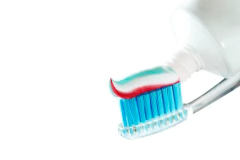 Toothbrush and toothpaste on blurred background. care for the oral cavity and Foto stock