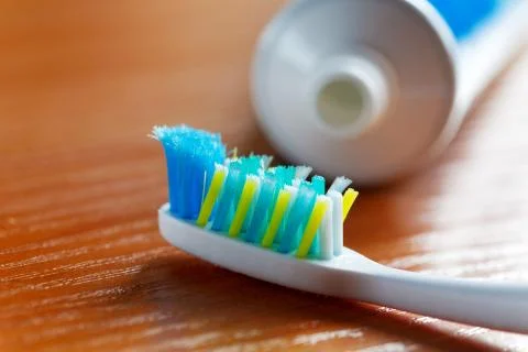 Toothbrush and toothpaste closeup Stock Photos