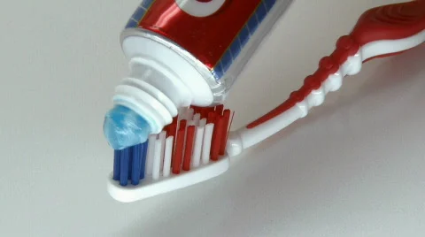 Toothbrush and toothpaste Stock Footage 728650
