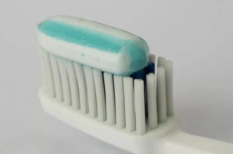 Toothbrush and toothpaste Stock Photos