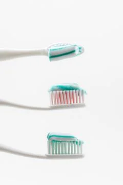 Toothbrush and toothpaste Stock Photos