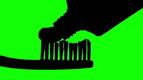 Toothbrush And Toothpaste (Silhouette With Green Background) Stock Footage