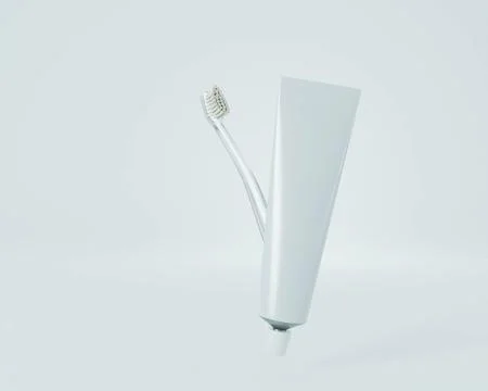 Toothbrush and toothpaste on white background Фото