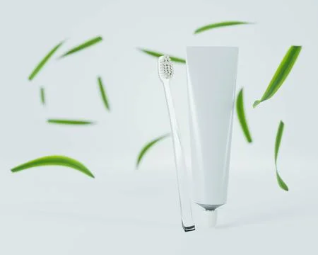 Toothbrush and toothpaste on white background Фото
