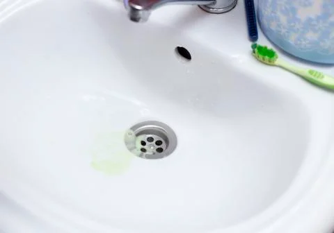 Toothbrush in bathroom Stock Photos