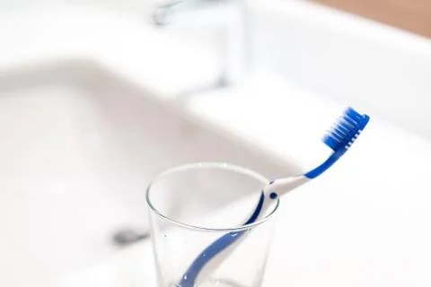 Toothbrush in the bathroom Stock Photos