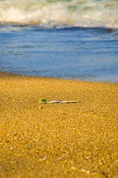 Toothbrush on a beach Foto stock