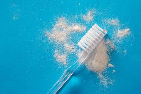 Toothbrush on blue backround Stock Photos