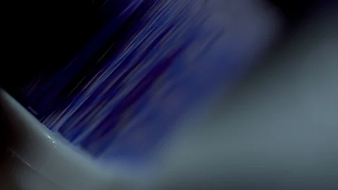 Toothbrush bristles macro dramatic light sweep Stock Footage 119079301