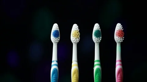 Toothbrush dark background nobody hd footage Stock Footage 104853802