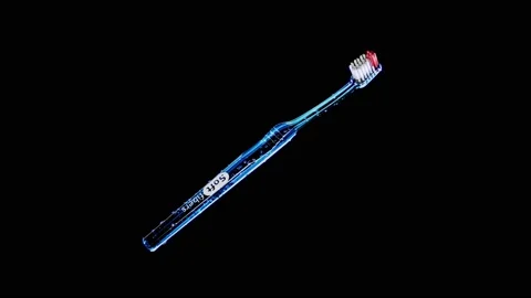 Toothbrush detailed reveal. No trademarks loop Stock Footage