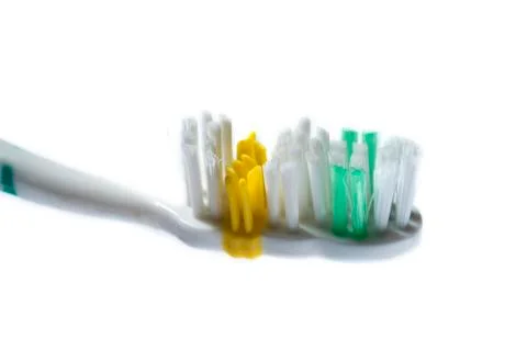 Toothbrush of different colors Stock Photos