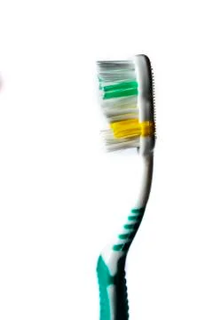 Toothbrush of different colors Stock Photos