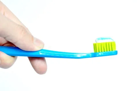 Toothbrush in hand 写真素材