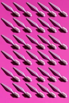 Toothbrush on the pink background seamless pattern. Trendy stylish health care Stock Photos
