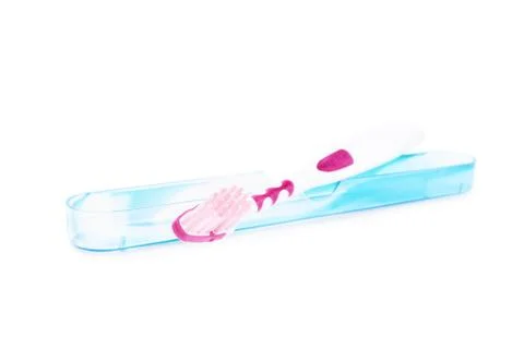 Toothbrush with a protective cover Stock Photos