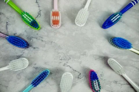 Toothbrush with space for text top view on marble background, dental hygien.. Stock Photos