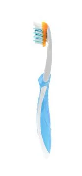 Toothbrush standing on the white background Stock Photos