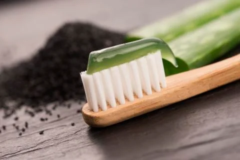 Toothbrush with toothpaste with aloe vera Stock Photos
