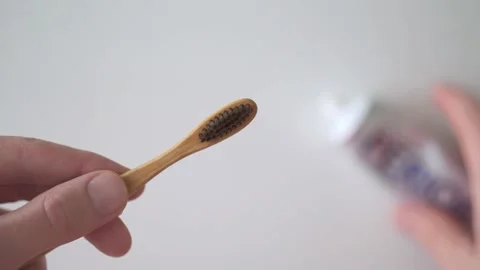 A toothbrush with toothpaste to approach the face Stock Footage 150317210