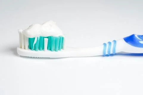 Toothbrush with toothpaste isolated Stock Photos