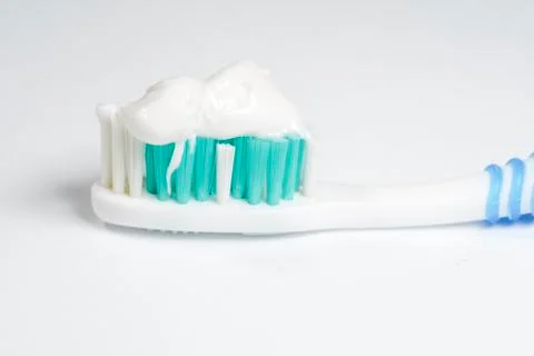 Toothbrush with toothpaste isolated Stock Photos