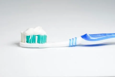 Toothbrush with toothpaste isolated Stock Photos