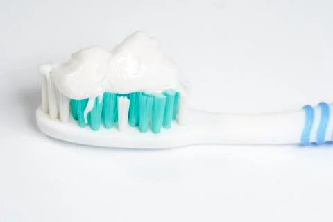 Toothbrush with toothpaste isolated Stock Photos