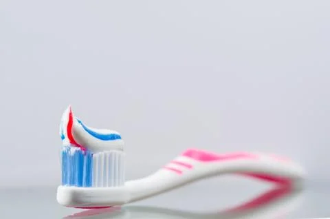 Toothbrush with toothpaste Stock Photos