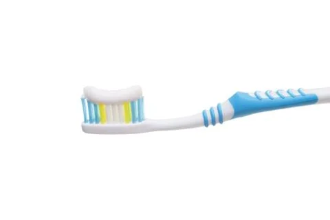 Toothbrush with toothpaste Stock Photos