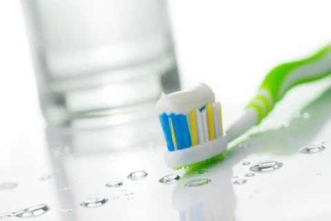 Toothbrush with toothpaste Stock Photos