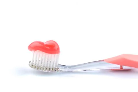 Toothbrush with toothpaste Stock Photos