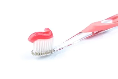 Toothbrush with toothpaste Stock Photos