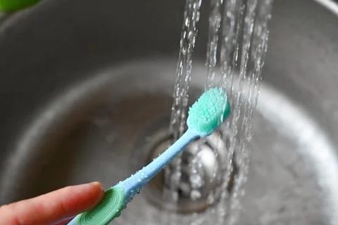 Toothbrush with toothpaste under water Stock Photos
