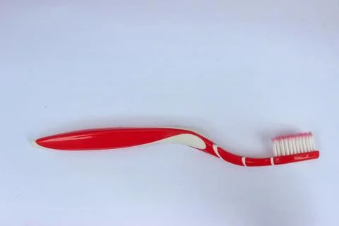 Toothbrush on white background close-up. Stock Photos