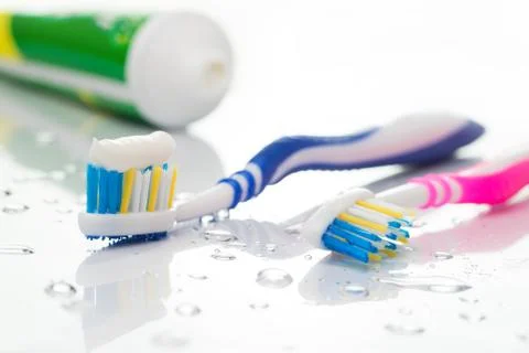 Toothbrushes and toothpaste Stock Photos